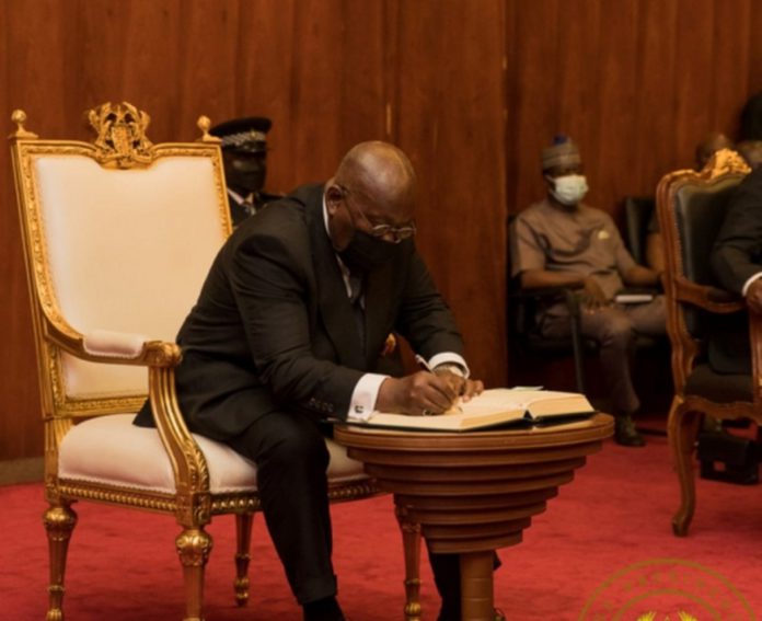 Akufo-Addo-signing-book-520x424_1288x1050