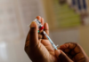 A nurse fills a syringe with malaria vaccine before administering it to an infant at the Lumumba Sub-County hospital in Kisumu, Kenya, July 1, 2022. REUTERS/Baz Ratner